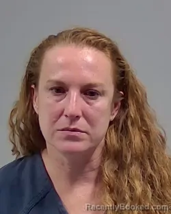 Mugshot of KELLI LANEL LARSON booked in Escambia County, Florida on April 3, 2026