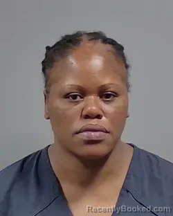 Mugshot of DENISE ZILPAH SNOWDEN booked in Escambia County, Florida on April 4, 2026