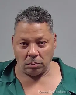 Mugshot of JAMES DARELL TOLIVER booked in Escambia County, Florida on April 6, 2026