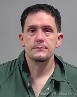 Mugshot of ZACHARY CHARLES ADAMS booked in Escambia County, Florida on April 9, 2026