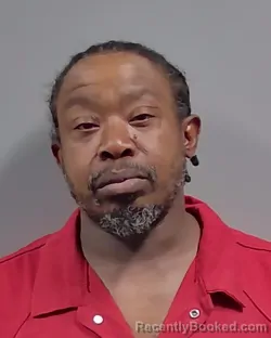 Mugshot of MARLON DEANDRE JOHNSON booked in Escambia County, Florida on April 22, 2026