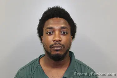 Mugshot of BRANDON ADONIS MCGINNIS booked in Escambia County, Florida on April 22, 2026