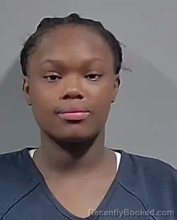 Mugshot of JANAVIA SIMONE JOHNSON booked in Escambia County, Florida on April 22, 2026