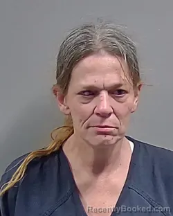 Mugshot of REBECCA LYNN WALKER booked in Escambia County, Florida on April 23, 2026
