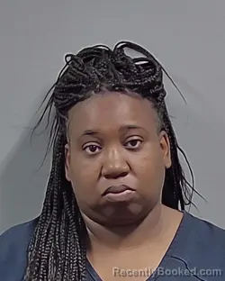 Mugshot of LIZETTA EVONNE HOSEA booked in Escambia County, Florida on April 23, 2026