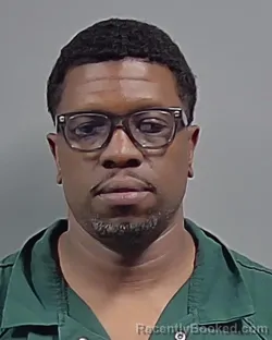Mugshot of SHERNARD LARON JOHNSON booked in Escambia County, Florida on April 24, 2026