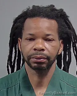 Mugshot of CALVIN DUANE BRYANT booked in Escambia County, Florida on April 26, 2026