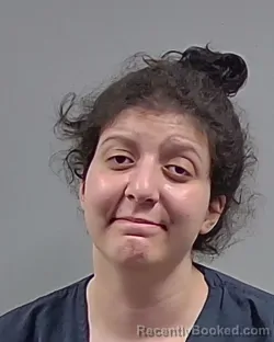 Mugshot of JADE NIAMH PERKINS booked in Escambia County, Florida on April 26, 2026