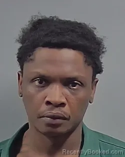 Mugshot of DEVIN DETRAI FLOYD booked in Escambia County, Florida on April 28, 2026