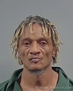 Mugshot of DEIDRICK RAYSEAN ROBBINS booked in Escambia County, Florida on April 28, 2026