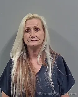 Mugshot of TINA PAULINE RAHN booked in Escambia County, Florida on April 29, 2026