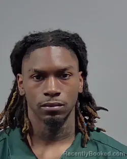 Mugshot of JHAMARRI MALIK OLIGE booked in Escambia County, Florida on April 30, 2026