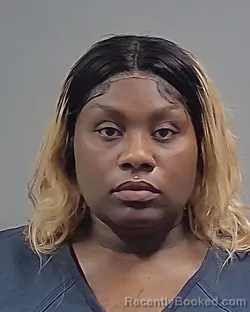Mugshot of RASHAVIA JEMEKIA MANUEL booked in Escambia County, Florida on April 30, 2026