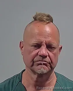 Mugshot of JOHN DAVID LEWIS booked in Escambia County, Florida on April 30, 2026