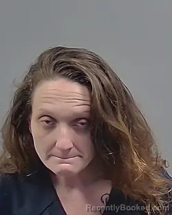 Mugshot of KRISTINA ELISE SAXON booked in Escambia County, Florida on April 30, 2026