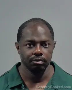 Mugshot of CONRAD FITZGERALD GREEN booked in Escambia County, Florida on May 1, 2026