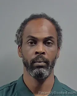 Mugshot of MAURY OLANDO CASSIMEER booked in Escambia County, Florida on May 7, 2026