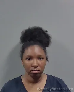 Mugshot of ANGELA LASHA MOORE booked in Escambia County, Florida on May 10, 2026