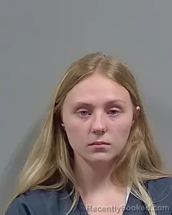 Mugshot of DESIRAE ANN RHODES booked in Escambia County, Florida on May 11, 2026