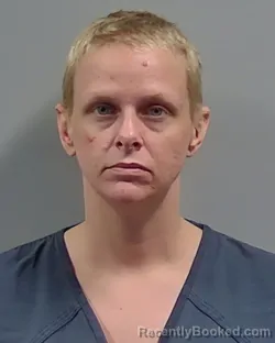 Mugshot of ASHLEY ANN LEAMAN booked in Escambia County, Florida on May 12, 2026