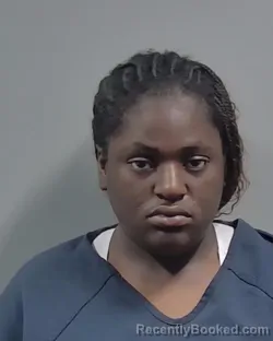 Mugshot of AALIYAH RENEE WHITE booked in Escambia County, Florida on May 13, 2026