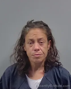 Mugshot of SARAH JEAN EVANS booked in Escambia County, Florida on May 14, 2026