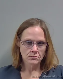 Mugshot of NICHOLE ANNE HUDSON booked in Escambia County, Florida on May 14, 2026