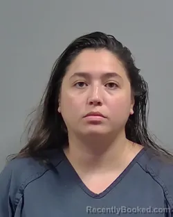 Mugshot of KATIE GUTIERREZ CUARTAS booked in Escambia County, Florida on May 17, 2026
