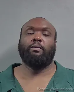 Mugshot of OMAR LEANDRE COLLIER booked in Escambia County, Florida on May 20, 2026