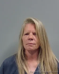 Mugshot of JENNIFER ANN HACKETT booked in Escambia County, Florida on May 21, 2026