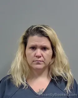 Mugshot of HOLLI NICOLE REPIN booked in Escambia County, Florida on May 21, 2026