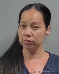 Mugshot of JUSTINE LIANA CRISOSTOMO booked in Escambia County, Florida on May 21, 2026