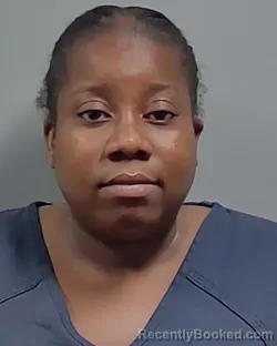 Mugshot of MOESHA RENEE JENKINS booked in Escambia County, Florida on June 21, 2026