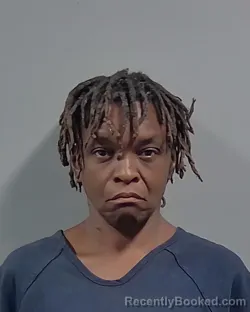 Mugshot of CATINA LATORIE REESE booked in Escambia County, Florida on June 22, 2026