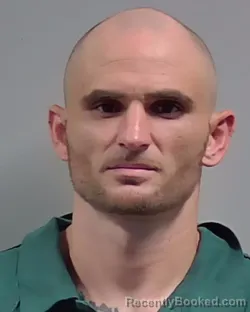 Mugshot of JOSHUA TREVOR GREEN booked in Escambia County, Florida on June 24, 2026