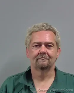 Mugshot of DONNIE CEPHAS JOHNSON booked in Escambia County, Florida on June 28, 2026