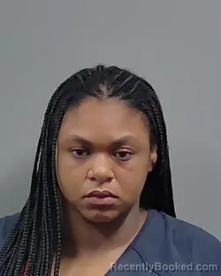Mugshot of TRAMENDOUS MERCHELLE HOLLINS booked in Escambia County, Florida on July 10, 2026