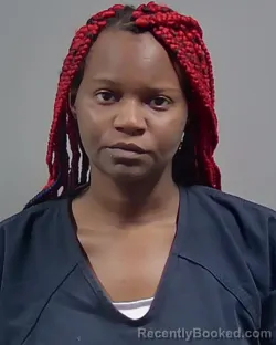 Mugshot of TYNEIKA MARSHIA CUNNINGHAM booked in Escambia County, Florida on July 15, 2026