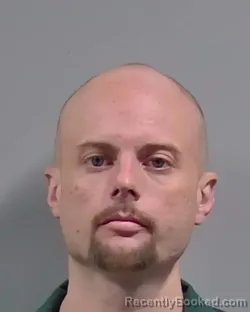 Mugshot of Nicholas Damian Sherouse booked in Escambia County, Florida on August 11, 2026