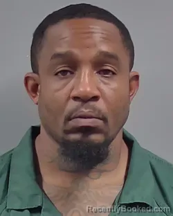 Mugshot of Kenwin Darell Mcmillian booked in Escambia County, Florida on August 14, 2026