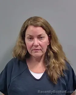Mugshot of Jean Paige Wenzel booked in Escambia County, Florida on August 16, 2026