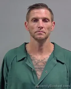 Mugshot of Joshua Nathan Wood booked in Escambia County, Florida on August 18, 2026