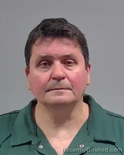 Mugshot of Eduardo Augusto Neves Scherer booked in Escambia County, Florida on August 21, 2026