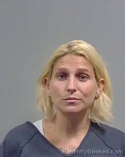 Mugshot of Nicole Elizabeth Boteler Adams booked in Escambia County, Florida on August 28, 2026