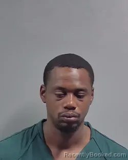 Mugshot of Brandon Reshawn Burnham booked in Escambia County, Florida on August 28, 2026