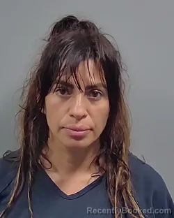 Mugshot of Lorena Alday Gomez booked in Escambia County, Florida on August 30, 2026