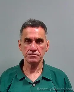 Mugshot of Julio Rogelio Baez booked in Escambia County, Florida on October 2, 2026