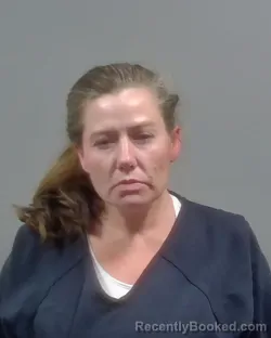 Mugshot of Kristine Nichole Bell booked in Escambia County, Florida on October 8, 2026
