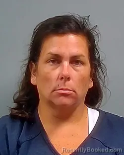 Mugshot of April Michelle Vialpando booked in Escambia County, Florida on October 11, 2026