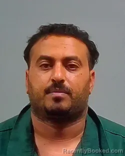 Mugshot of Mohamed Hassan Ahmed Hajaji booked in Escambia County, Florida on October 11, 2026